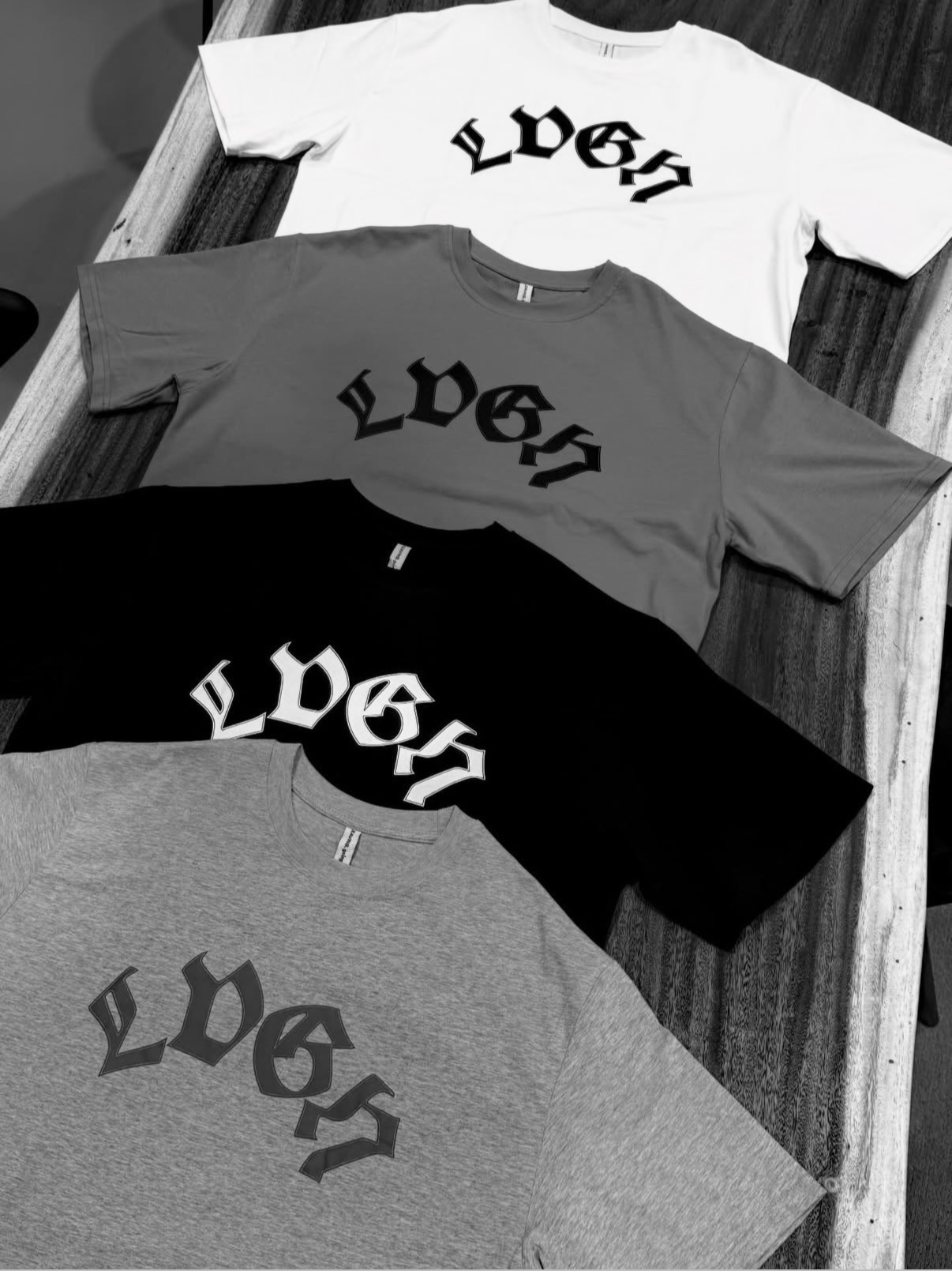 LVGN T-shirts arranged on a table